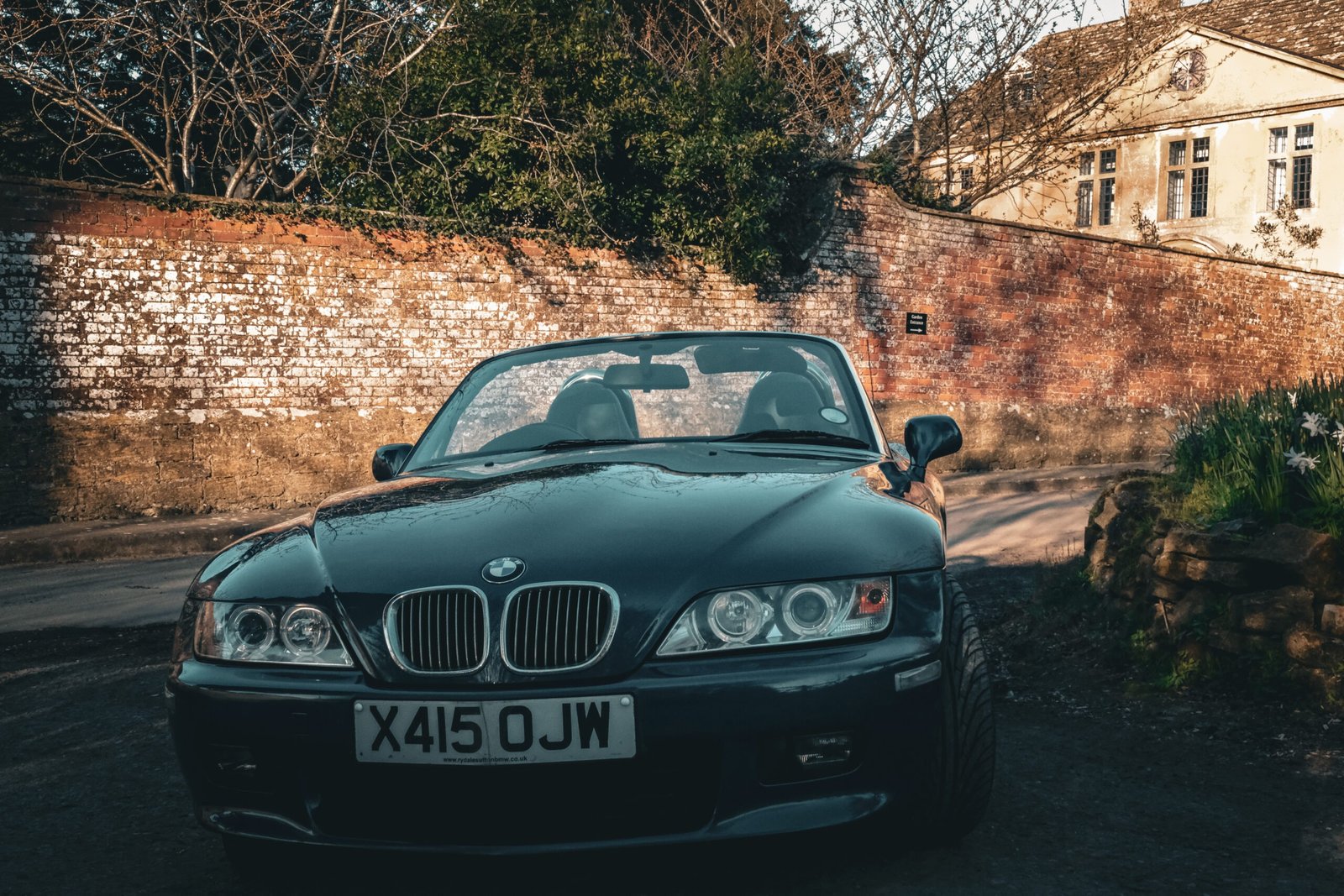 Land Rover Defender parked in Somerset on a woodland track