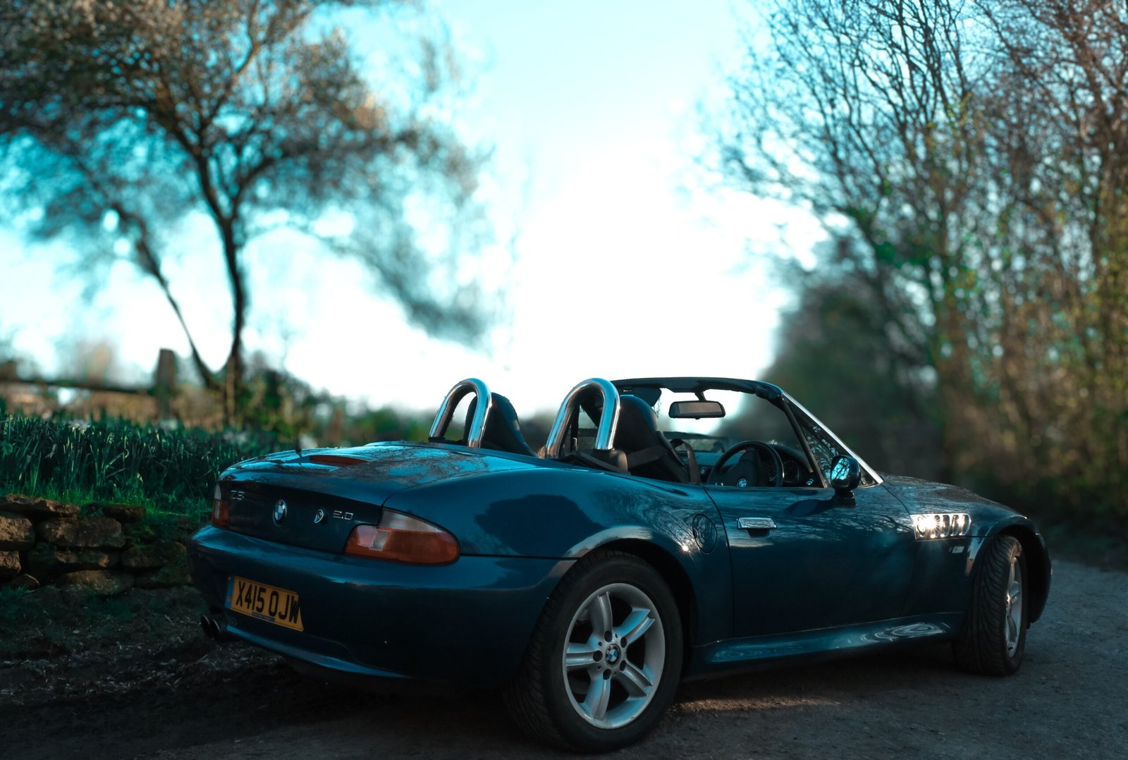Gun Metal Land Rover Defender with a winch in Somerset woodland